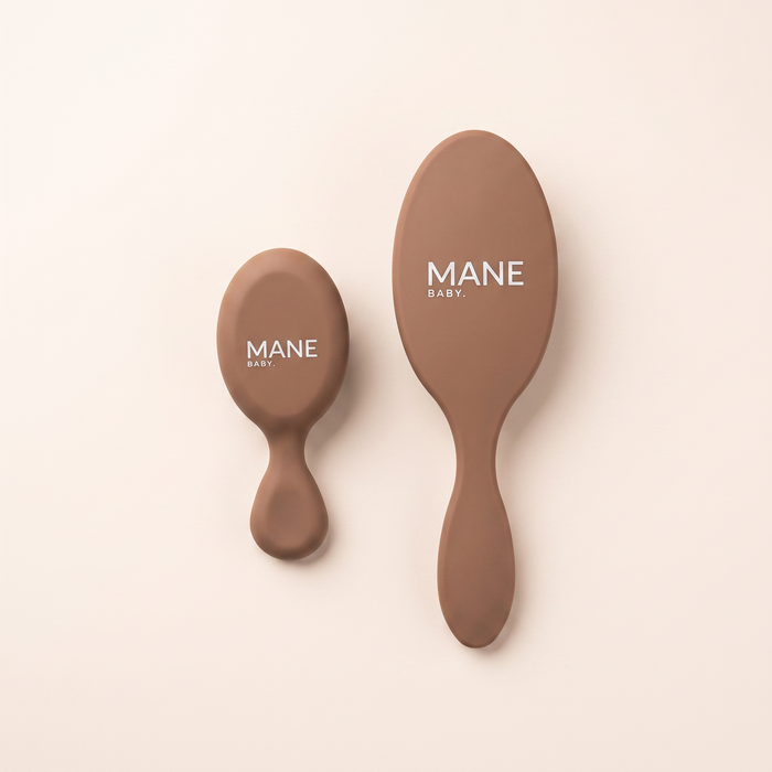 Mane Baby Brush Duo, the full-size Original brush and the compact Mini brush shown side by side